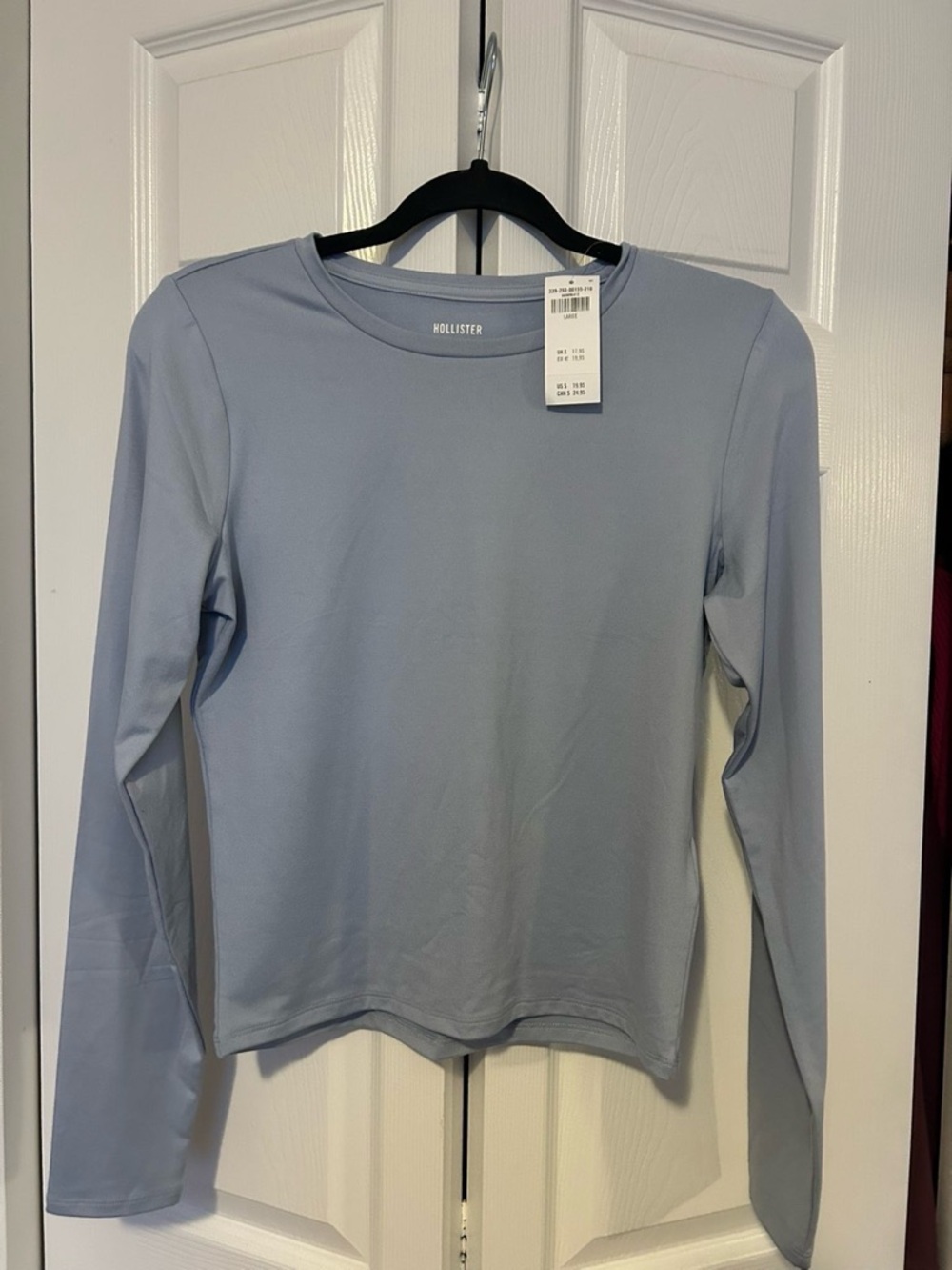 Hollister Women's Long-Sleeve Top in Pale Blue